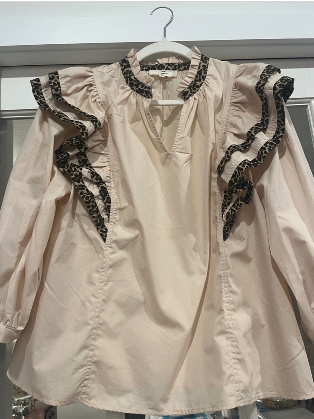 Entro Women’s Cream Ruffle Blouse with Leopard Trim